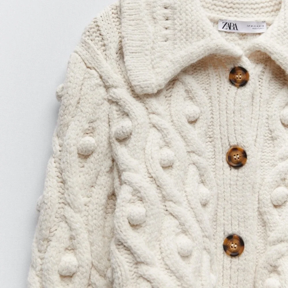 Cozy Cable Knit Button-Front Cream Sweater - Picture 6 of 12